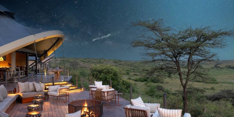 Nighttime safari deck dining and lifestyle experience